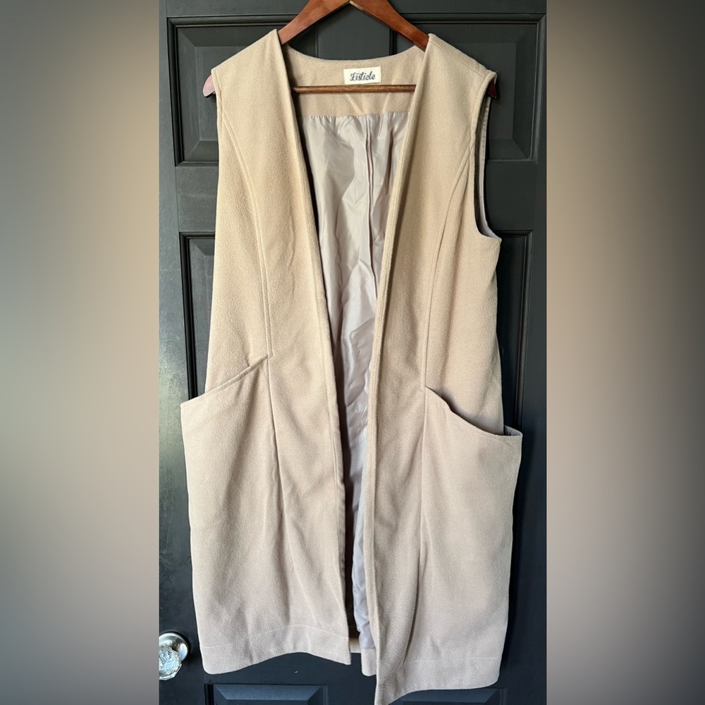 Listicle mid length vest
